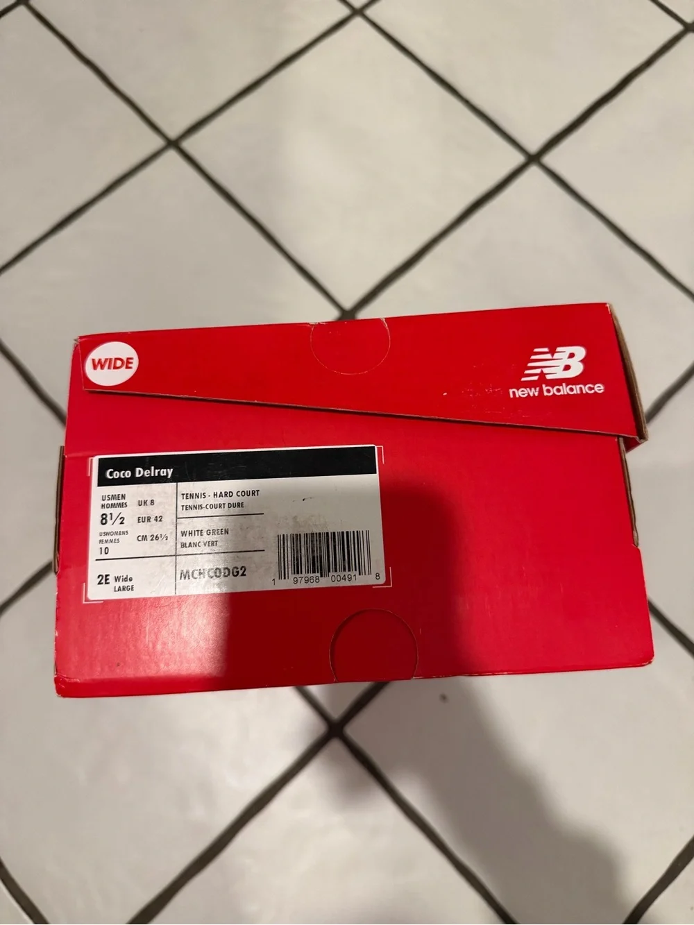 New Balance White Athletic Sneakers with Green Accents and Gum Outsole